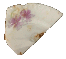 Fragment of ceramic with pink flowers.